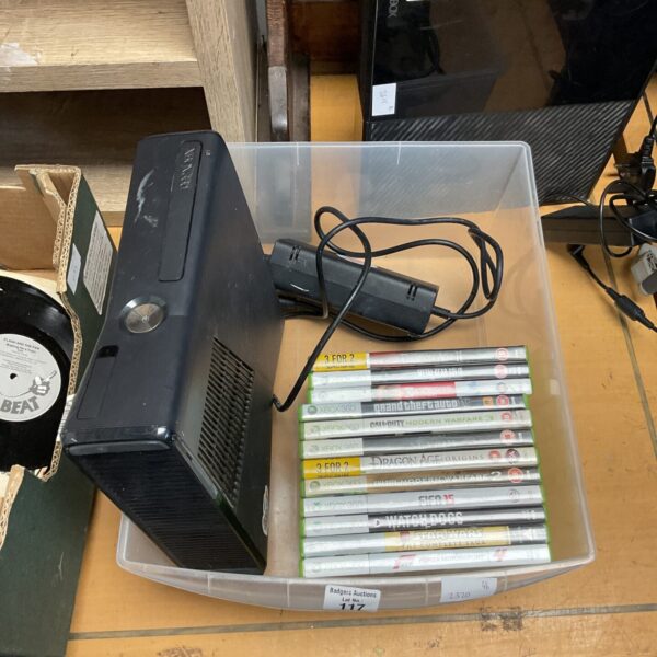 Microsoft Xbox 360 console with included games for retro gaming.