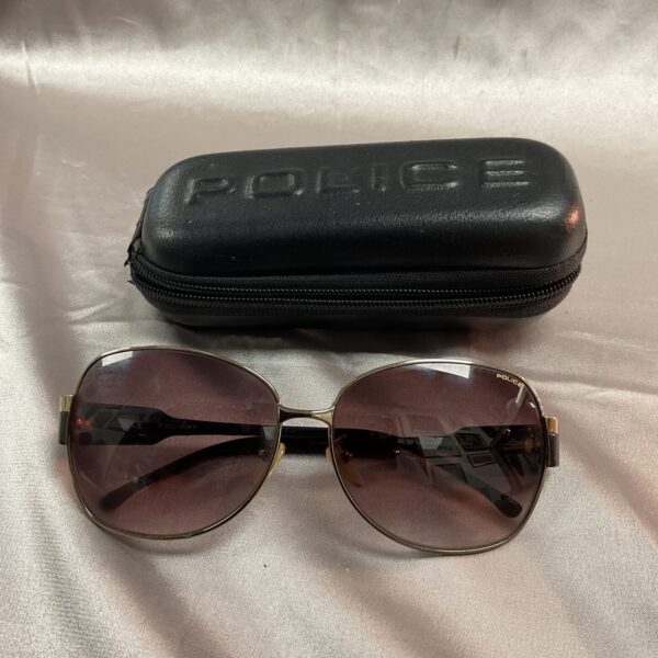 Vintage Police sunglasses with a sleek frame design.