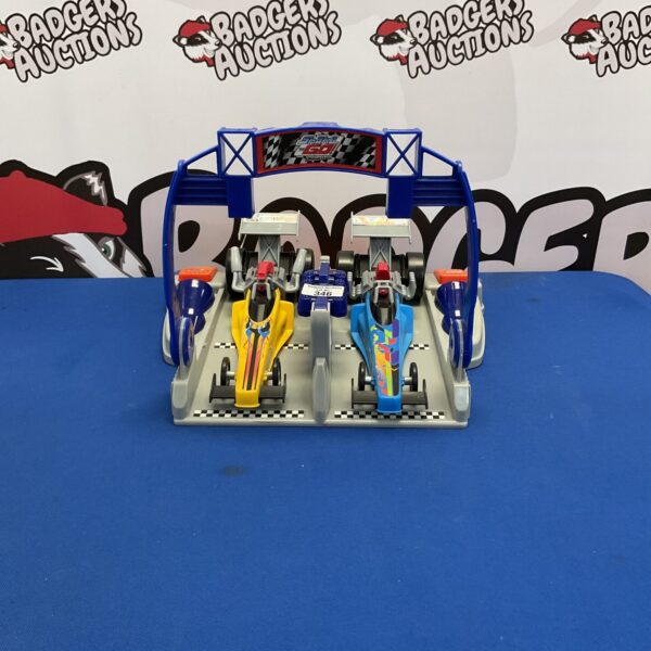 Fisher Price Shake N Go Dragsters playset with racing track.