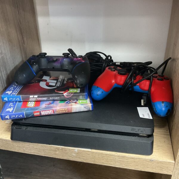 PlayStation 4 Slim bundle with controllers and Gran Turismo Sport game.