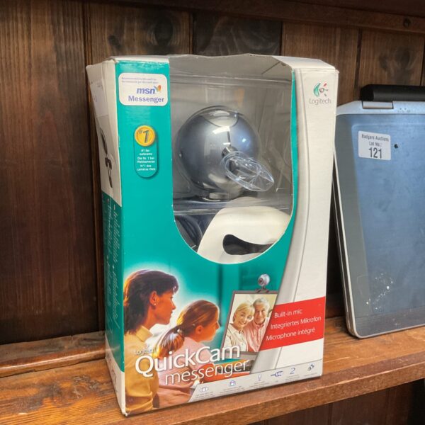 Silver Logitech Quickcam Messenger webcam for vintage computer setups.