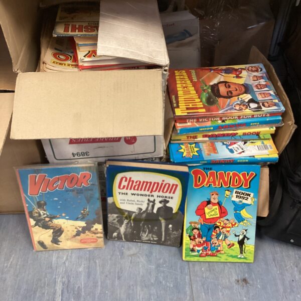 Bundle of vintage British comics and annuals, including The Dandy and The Victor.
