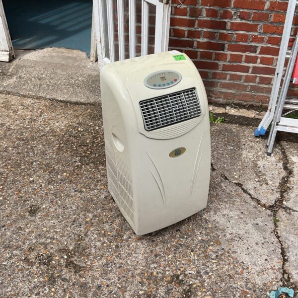 White Ced portable air conditioner unit for cooling a room.