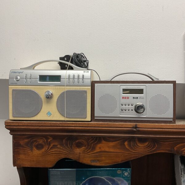 Red Intempo DAB radio, vintage portable digital radio.