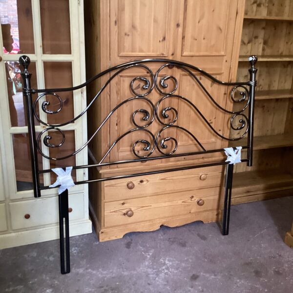 Ornate Victorian metal double headboard for bedroom furniture.