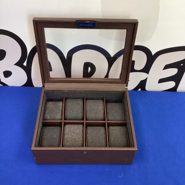 Leatherette Stackers watch box for secure timepiece storage.