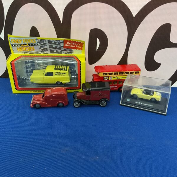 Yellow diecast model of the Only Fools and Horses van.