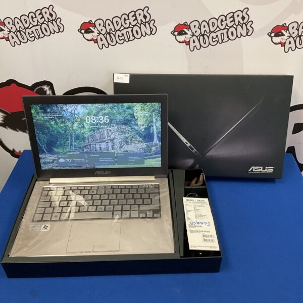 Asus Zenbook laptop with Intel Core i7 processor, open screen.