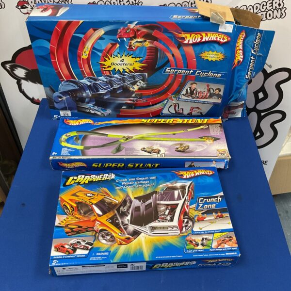 Boxed Hot Wheels Super Stunt playsets, vintage 90s toy lot.