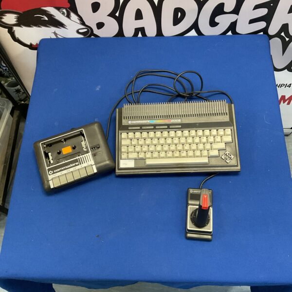 Vintage Commodore Plus 4 computer with datassette and joystick.