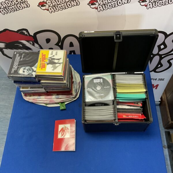 Assorted DVD and CD lot including World War 2 documentary and Frank Sinatra.