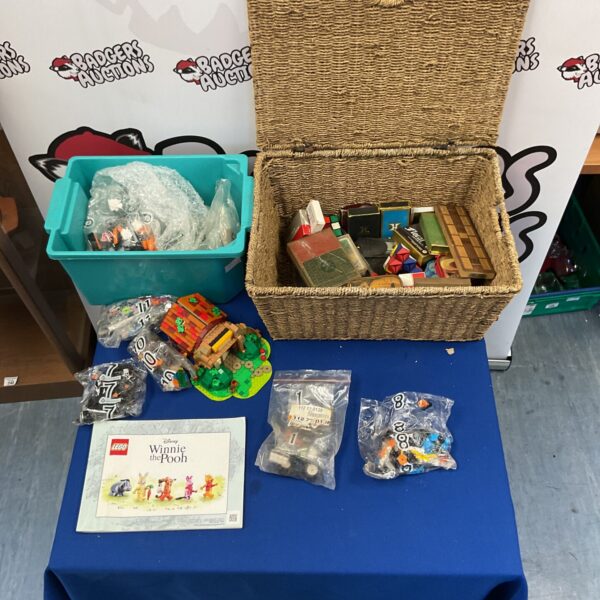 Lego Disney Winnie the Pooh set with Rubik's Cube and mixed items.