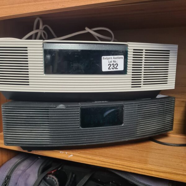 Pair of vintage Bose Wave radios for audio enthusiasts.