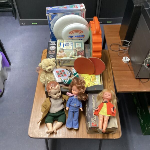 Mixed lot of vintage childrens toys on a tray.