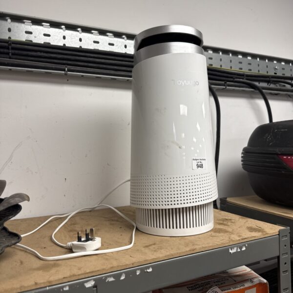 Portable Toyuugo dehumidifier for moisture removal in small spaces.