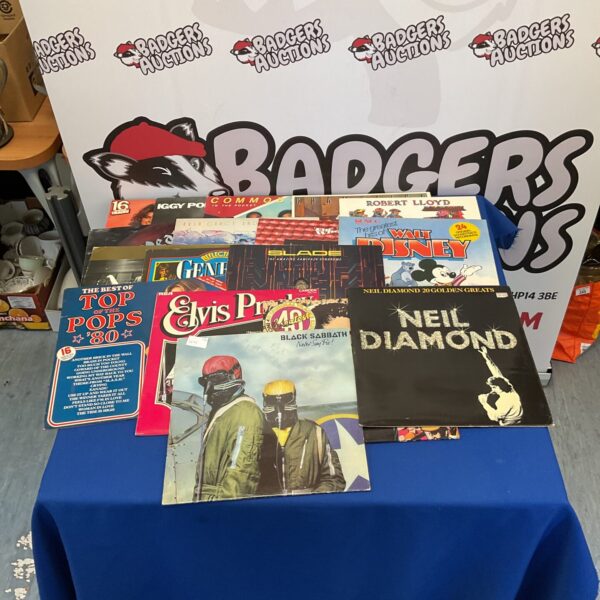 Vintage vinyl LP collection featuring Elvis, Black Sabbath, and Neil Diamond.