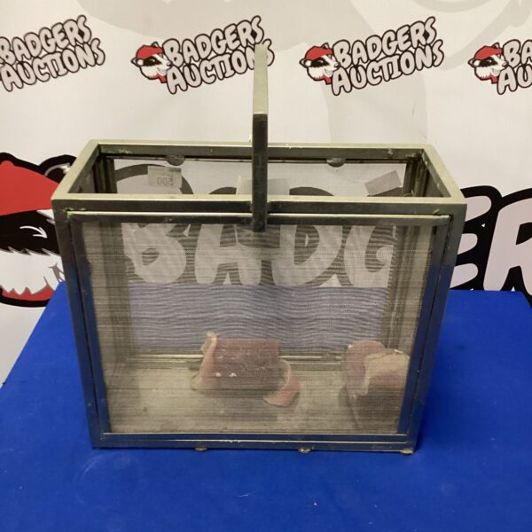 Vintage wire candle basket with handles, ideal for farmhouse decor.