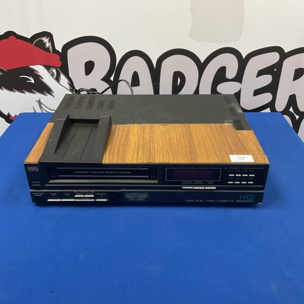 Front view of a vintage Amstrad VCR-4600 video cassette recorder.