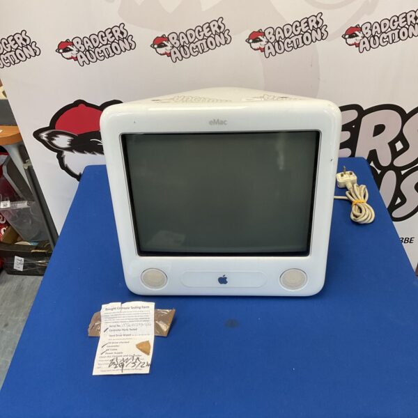 Vintage Apple eMac A1002 computer with curved monitor.