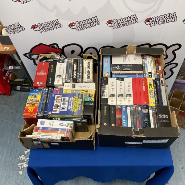 Mixed lot of DVDs and box sets including Rocky and Lord of the Rings.