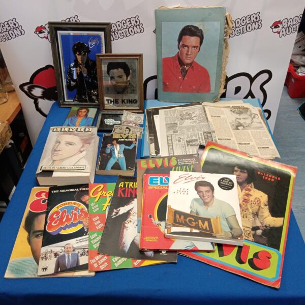 Vintage Elvis Presley ephemera collection including books and scrapbook.