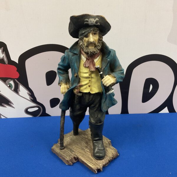 Detailed resin pirate captain figure with peg leg and cutlass.