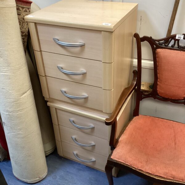 Pair of vintage three-drawer bedside cabinets for bedroom storage.