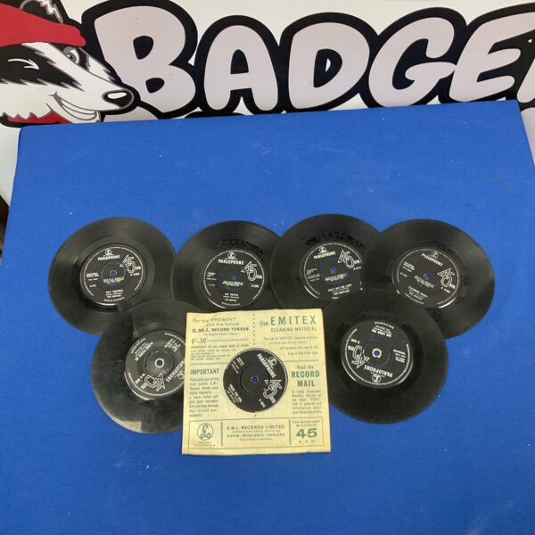 Vintage Beatles 7 inch vinyl singles, collectible records.