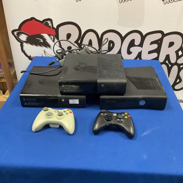 Xbox 360 E console lot with remotes and power cords.