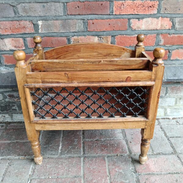 Vintage Indian oak magazine rack with iron lattice front.