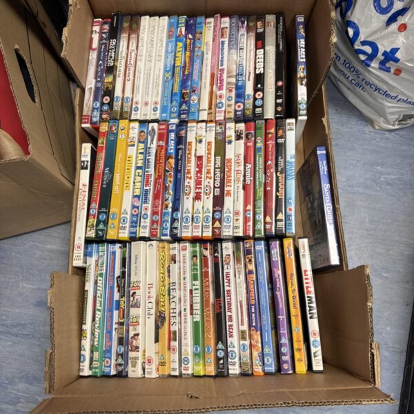 Tray of mixed DVDs including Hook and Big Hero 6.