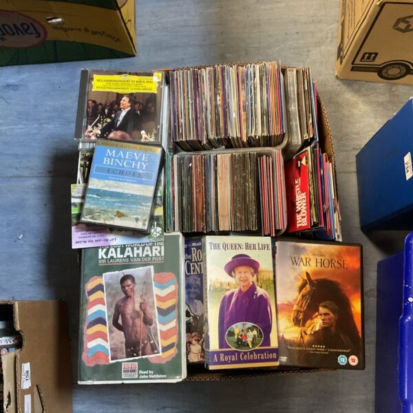 Large mixed media collection of VHS tapes, CDs, and DVDs for sale.