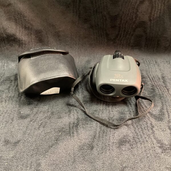 Vintage Pentax 12x24 UCF binoculars in good condition.