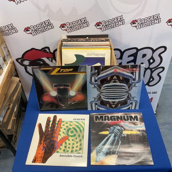 Rock LP collection featuring Top and Genesis vinyl records.