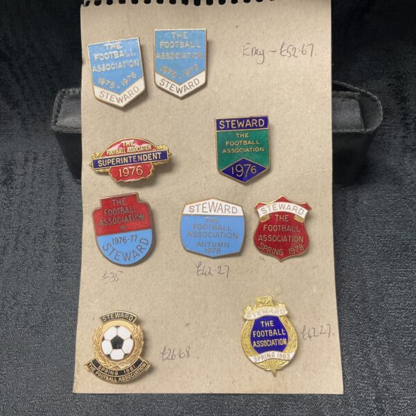 Vintage Wembley Stadium steward badge, a collectible piece of football memorabilia.