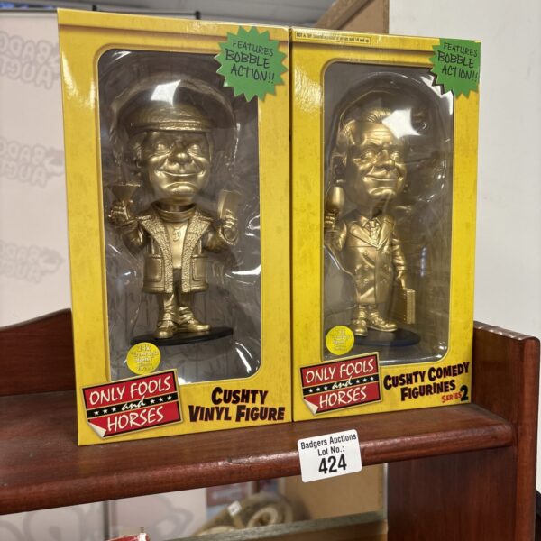 Pair of Only Fools and Horses 24K bobbleheads featuring Del Boy and Rodney.