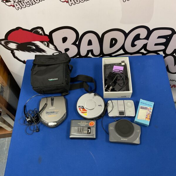 Mixed lot of vintage Sony Discman, Aiwa cassette player, and Samsung tablet.