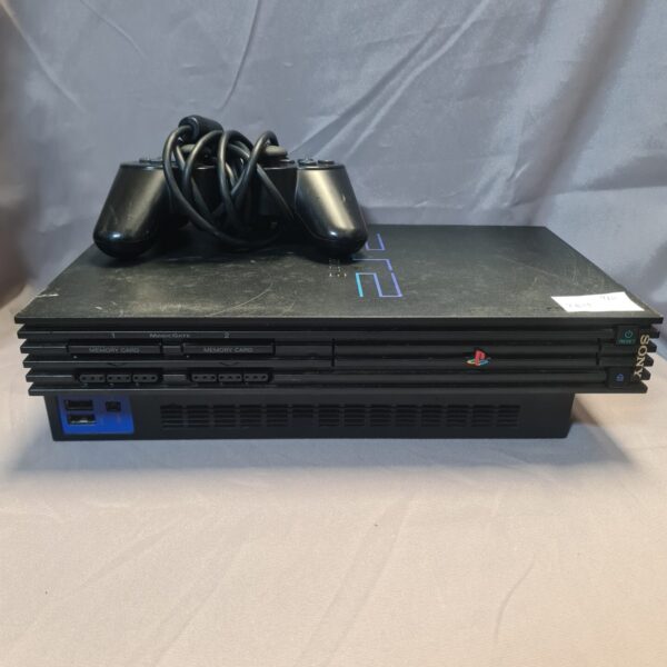 Black Sony PlayStation 2 console with controller for retro gaming.