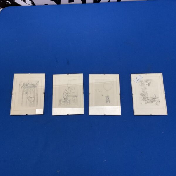 Vintage set of four Winnie the Pooh prints for charming wall decor.