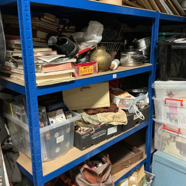 Mixed lot of clearance items including boxes and books.