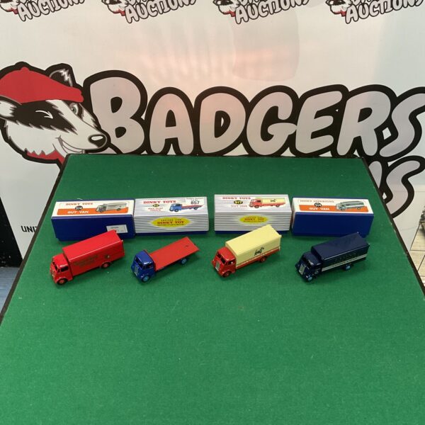 Vintage Dinky Toys Guy Vans and Flat Truck diecast model lot.