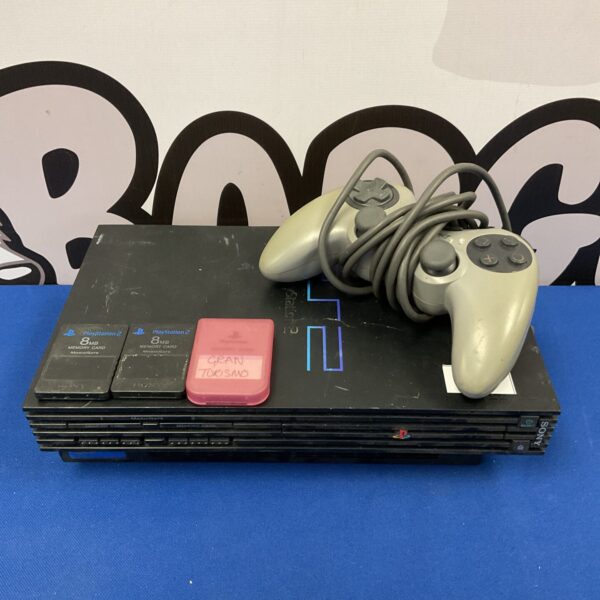 Sony PlayStation 2 console with controller and memory card.