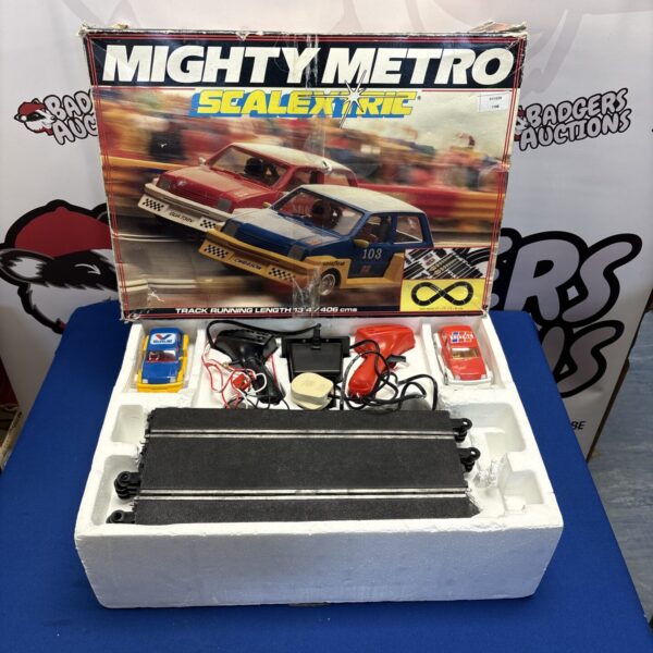 Vintage Scalextric Mighty Metro race track set in box.
