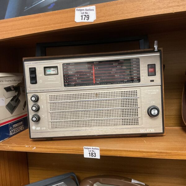 Vintage Selena Vega 215 radio receiver with wooden cabinet.