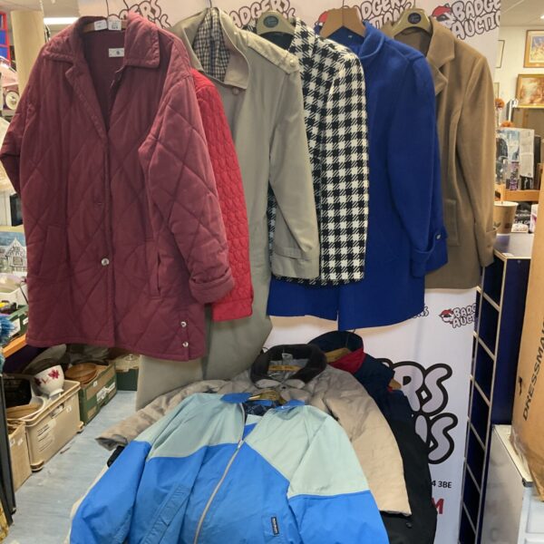 Mixed lot of vintage coats and jackets, including patterned and solid designs.