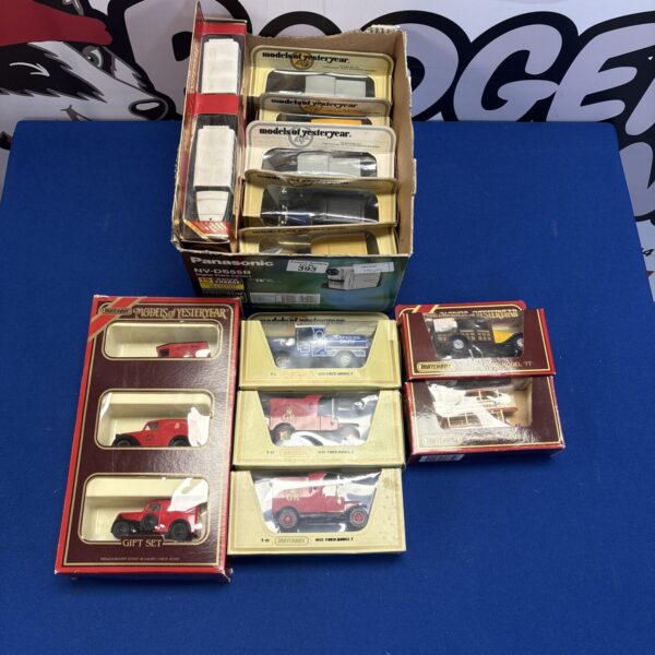 Vintage Matchbox diecast models in original boxes, collectible toy cars.