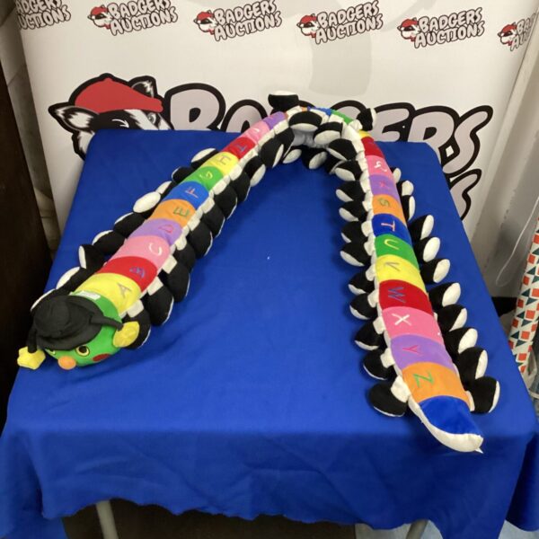 Colourful alphabet centipede draft excluder for blocking drafts.