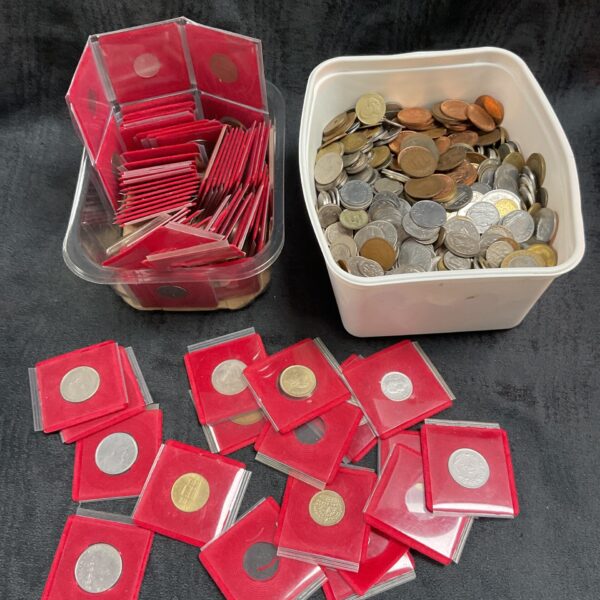Assorted coin lot with mounted and loose coins in tubs.