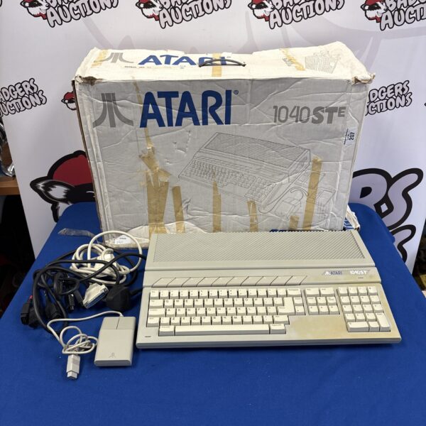 Boxed Atari 1040STE computer system, a vintage 8-bit computer.