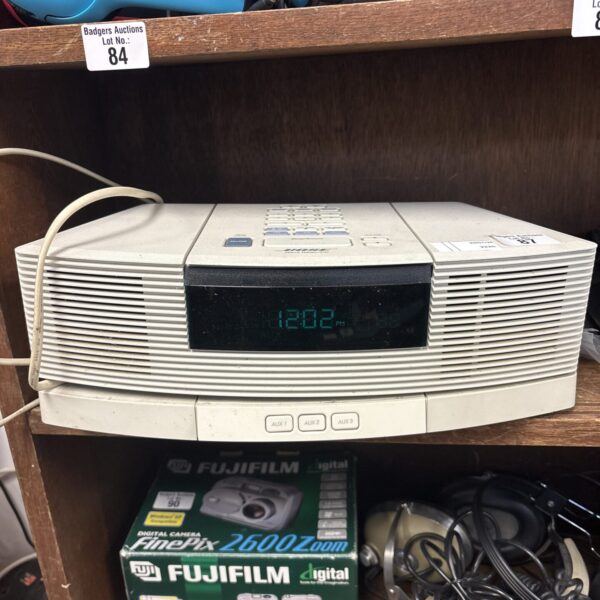 Vintage Bose Wave radio and CD player tabletop audio system.